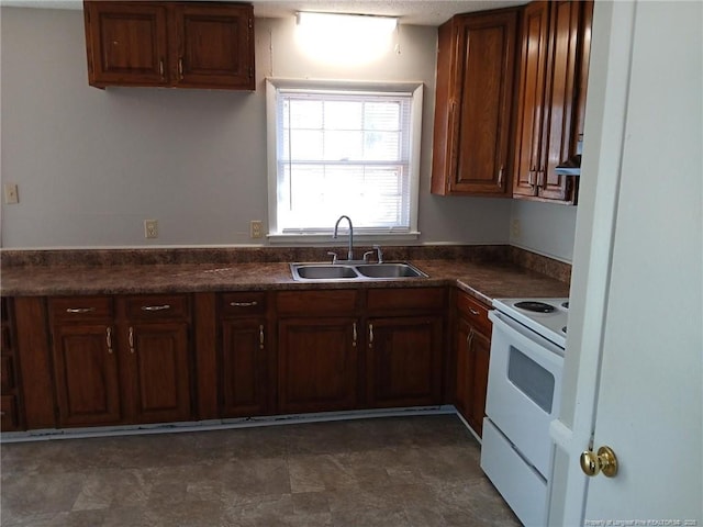 kitchen with sink and white electric range