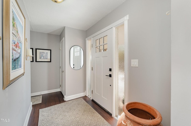 foyer featuring dark hardwood / wood-style flooring