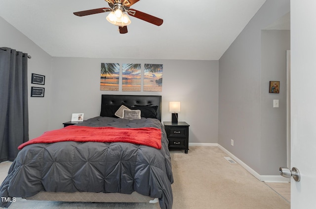 bedroom featuring carpet floors, ceiling fan, and vaulted ceiling