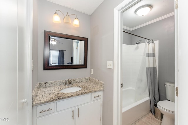 full bathroom with ornamental molding, vanity, toilet, and shower / bath combo