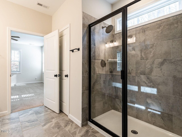 bathroom featuring an enclosed shower