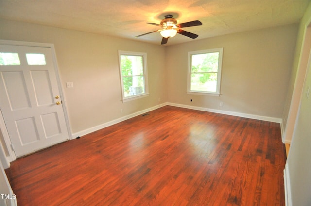 foyer featuring dark hardwood / wood-style floors and ceiling fan