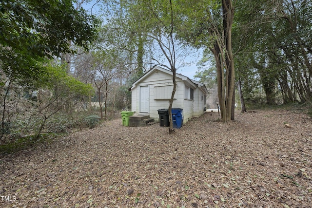 exterior space with a storage shed