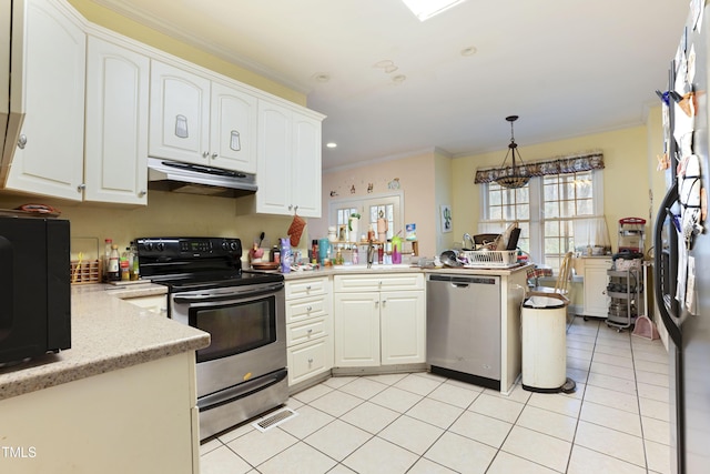 kitchen featuring light tile patterned flooring, appliances with stainless steel finishes, white cabinets, hanging light fixtures, and kitchen peninsula