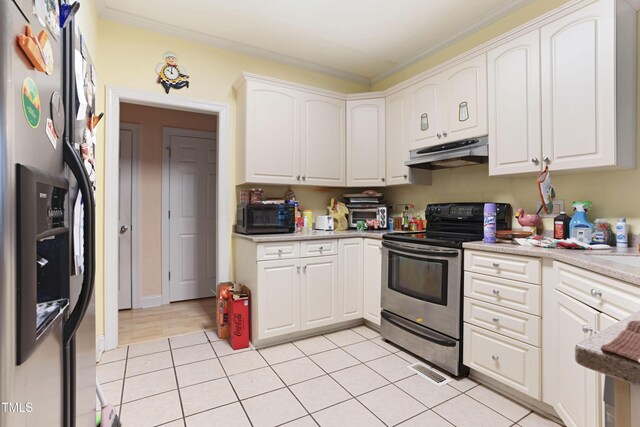 kitchen featuring light tile patterned flooring, ornamental molding, appliances with stainless steel finishes, and white cabinets