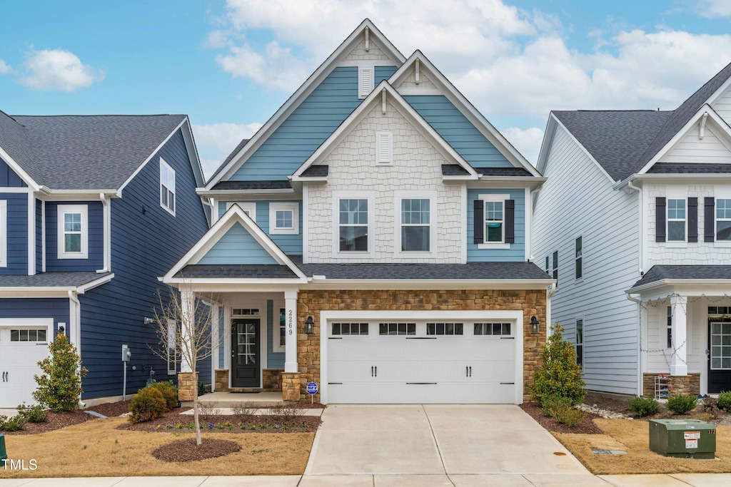 craftsman-style home featuring a garage