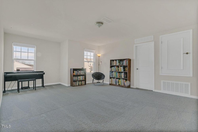 living area featuring carpet flooring