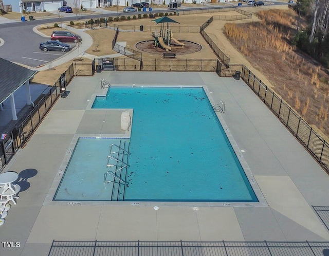 view of swimming pool featuring a patio