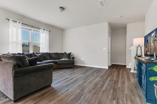 living room featuring dark hardwood / wood-style floors