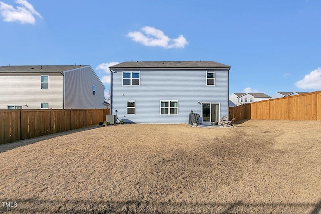 back of property featuring central AC unit