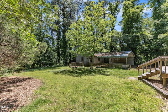 view of yard featuring a deck