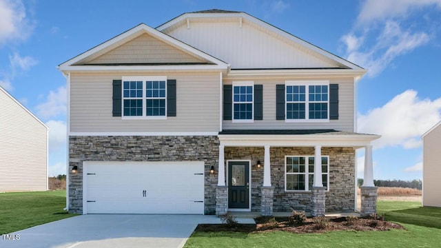 craftsman inspired home with a garage, covered porch, and a front lawn