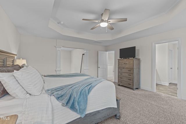 bedroom with baseboards, a raised ceiling, light colored carpet, ceiling fan, and ornamental molding