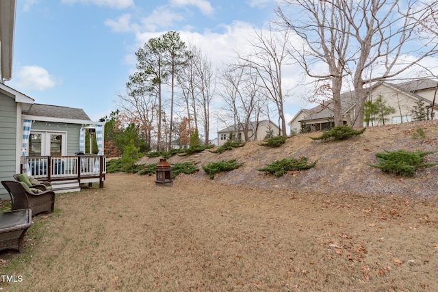 view of yard featuring a deck