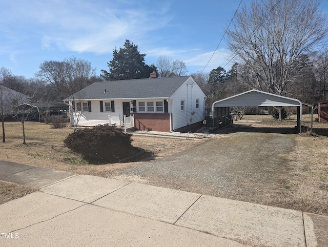 view of front of property with a carport