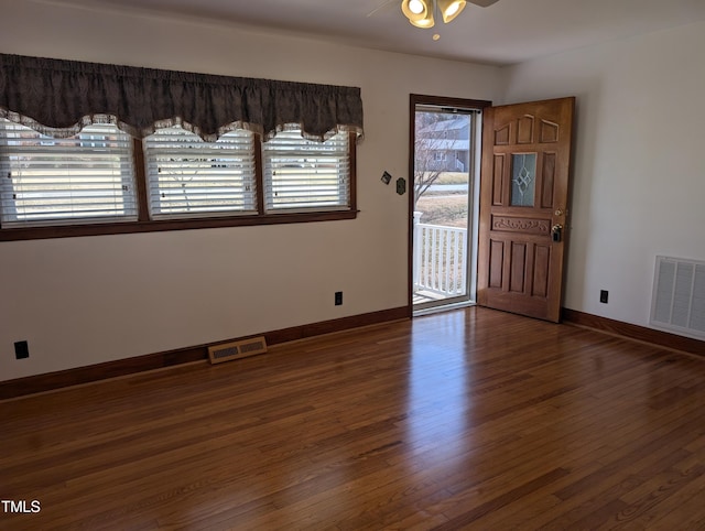 entryway featuring dark hardwood / wood-style floors and ceiling fan