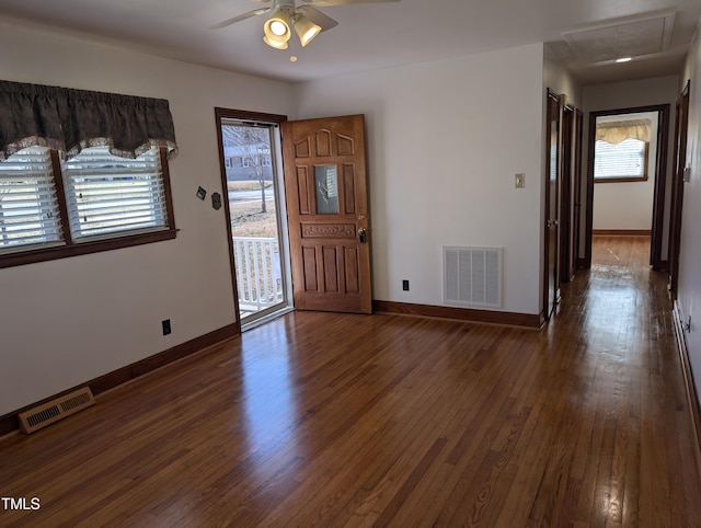 entryway featuring ceiling fan and dark hardwood / wood-style flooring