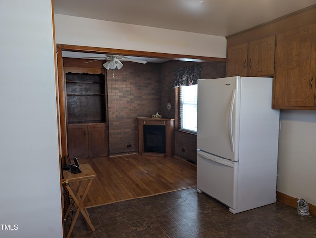 kitchen with white refrigerator and ceiling fan