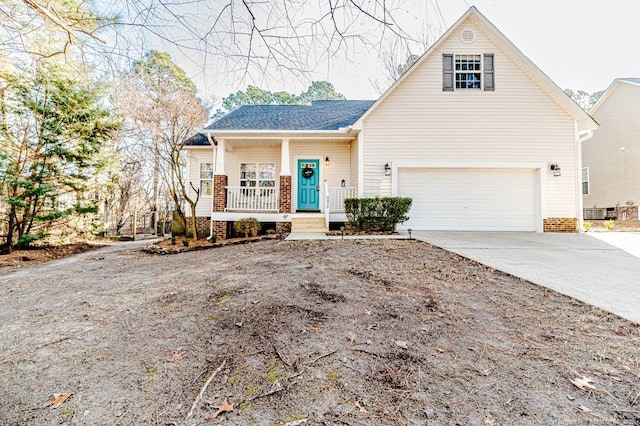 view of front facade featuring a porch, a garage, and cooling unit