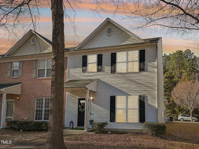 view of front of home with central AC unit