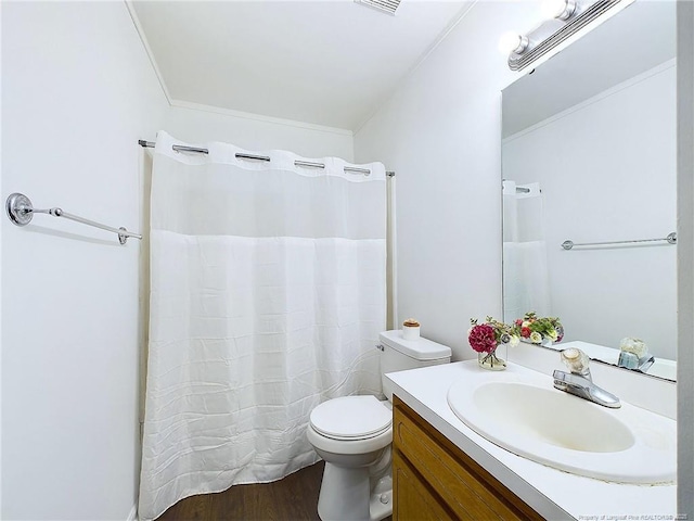 bathroom with vanity, hardwood / wood-style floors, and toilet