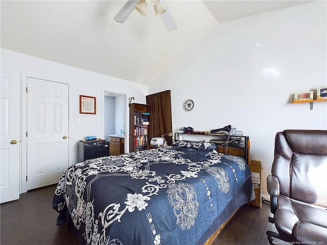 bedroom featuring dark wood-type flooring, ceiling fan, and high vaulted ceiling