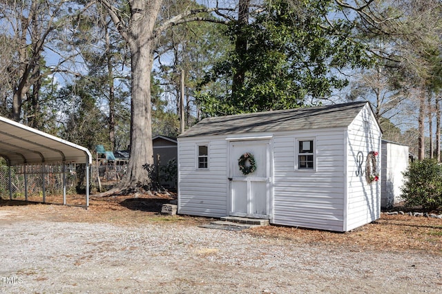 view of outdoor structure with a carport