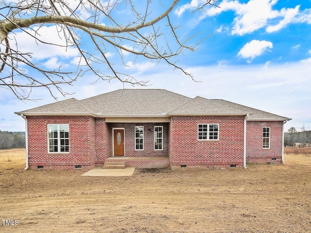 rear view of house with a lawn