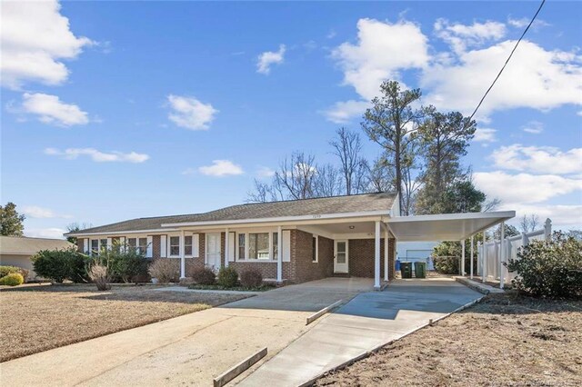 view of front of house featuring a carport