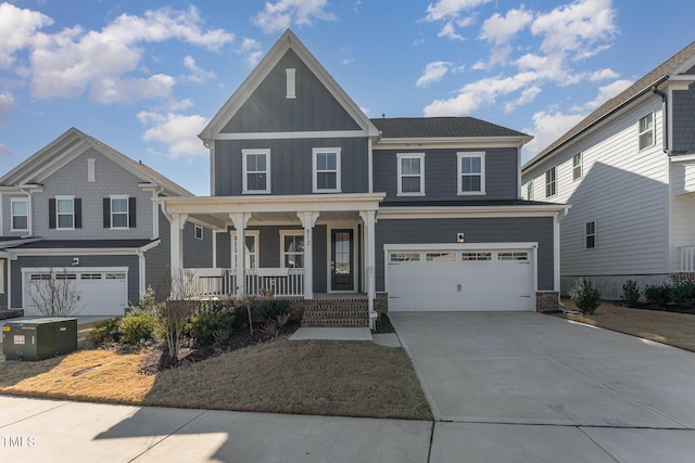 view of front of home featuring a garage and a porch