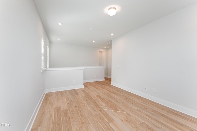 spare room with light wood-type flooring