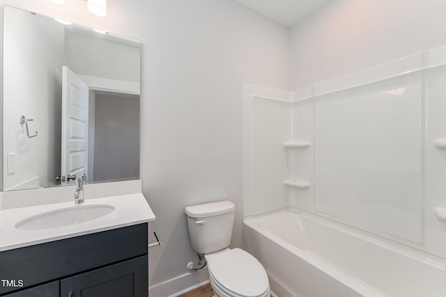 full bathroom featuring shower / tub combination, vanity, and toilet