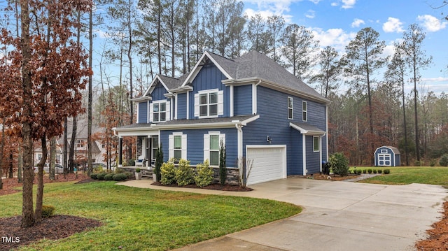 view of front facade featuring a garage, a front yard, a storage unit, and covered porch