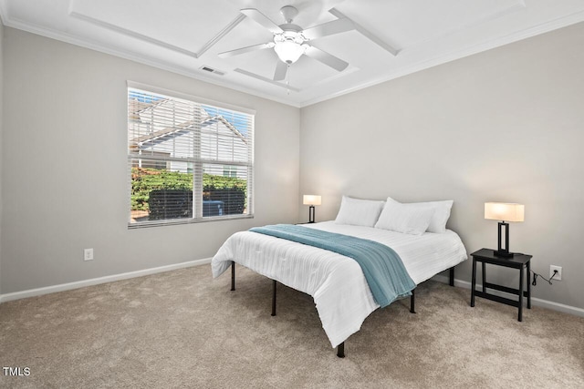 bedroom with visible vents, a ceiling fan, carpet floors, crown molding, and baseboards