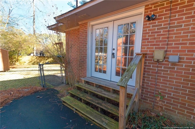 entrance to property featuring french doors