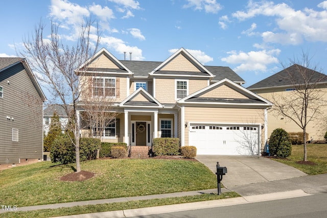 craftsman-style house featuring a garage and a front yard