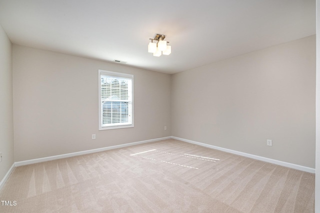 view of carpeted spare room