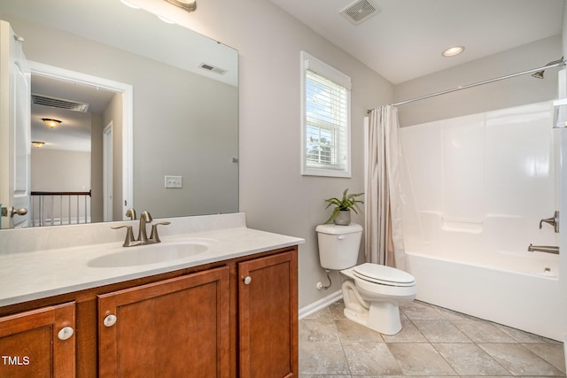 full bathroom featuring vanity, toilet, tile patterned flooring, and shower / bath combo with shower curtain