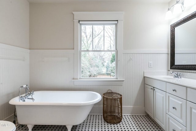 bathroom featuring vanity and a bathtub