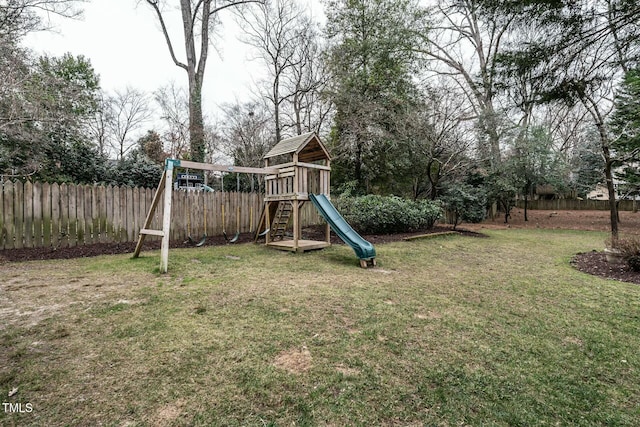 view of jungle gym with a lawn