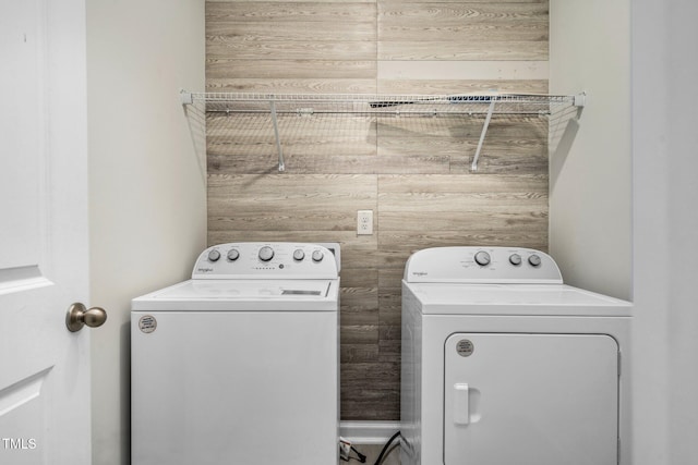 washroom with independent washer and dryer