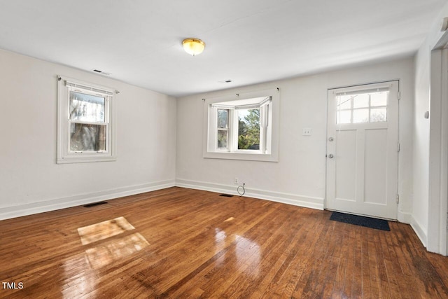 entrance foyer with dark wood-type flooring