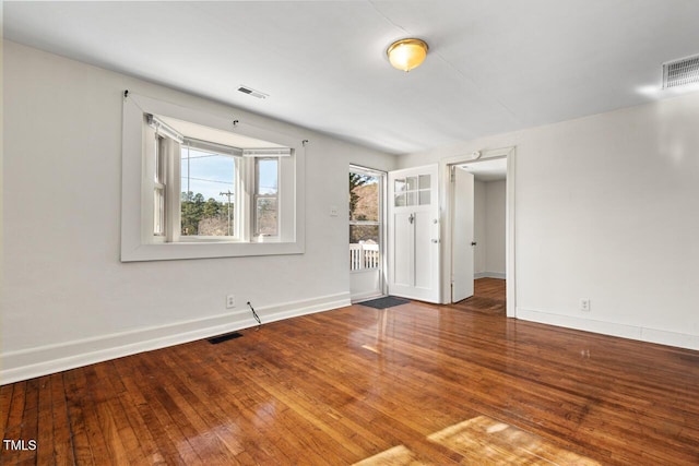 unfurnished bedroom featuring hardwood / wood-style floors