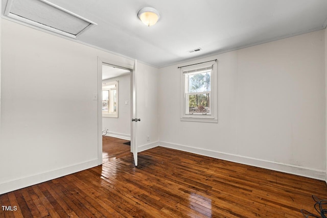 empty room featuring hardwood / wood-style flooring