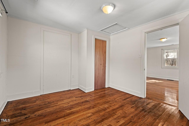 unfurnished room with dark hardwood / wood-style floors