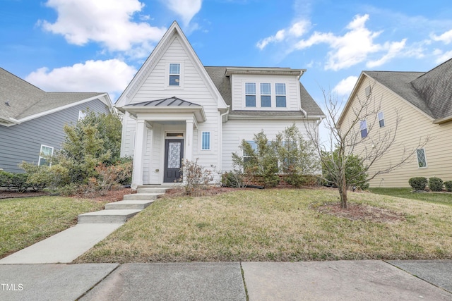 view of front facade with a front yard