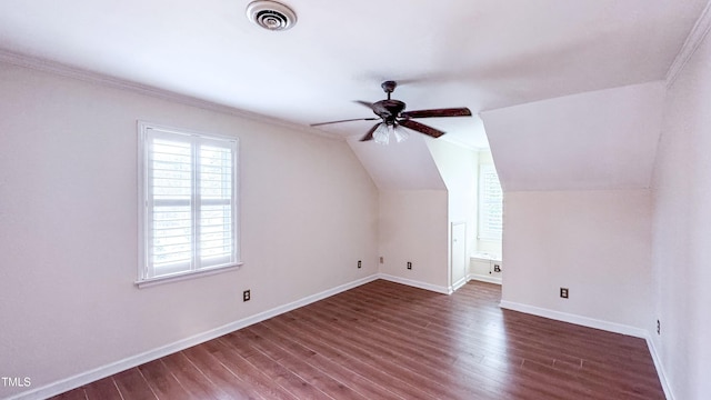 bonus room featuring ceiling fan, dark hardwood / wood-style flooring, and vaulted ceiling