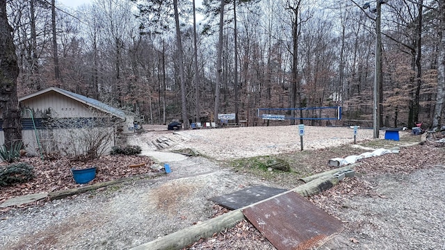 view of yard featuring volleyball court