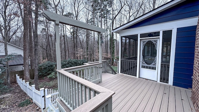 deck featuring a sunroom