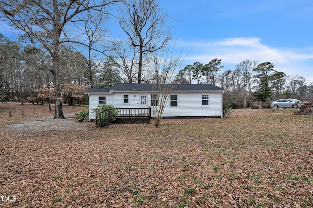 view of front of house with a wooden deck